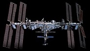 Photo of the International Space Station used as an analogy for the processor datapath as hardware that performs operations.